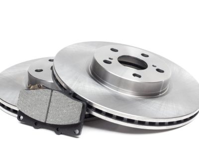 ventilated brake discs and pads on a white background